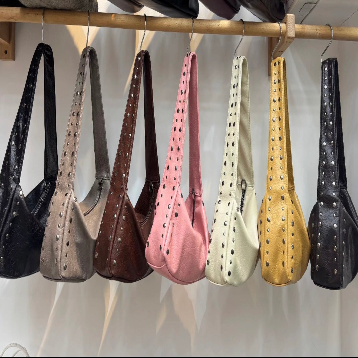 Studded shoulder bag